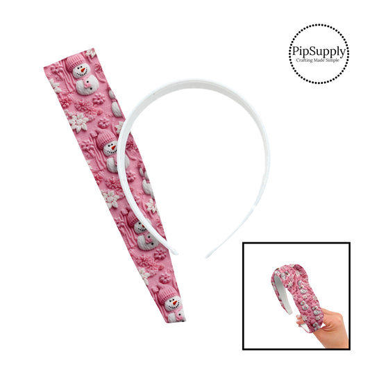 These holiday sewn embroidered headband kits are easy to assemble and come with everything you need to make your own knotted headband. These Christmas kits include a custom printed and sewn fabric strip and a coordinating velvet headband. The design elements contain pink and white snowflakes and snowman on pink. 