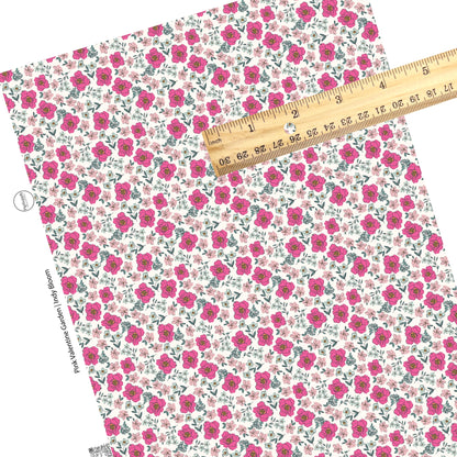 These Valentine's pattern themed faux leather sheets contain the following design elements: small bright pink and light pink flowers on white. Our CPSIA compliant faux leather sheets or rolls can be used for all types of crafting projects.