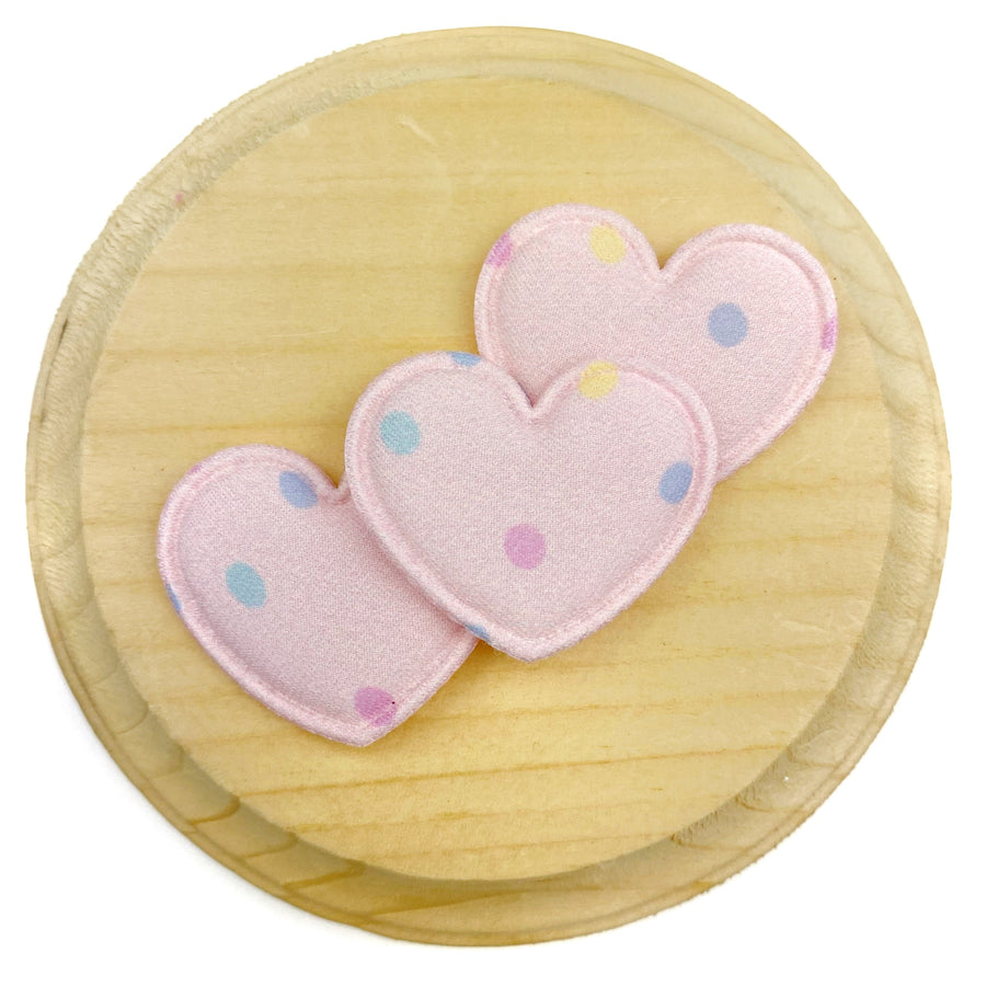 Soft pink heart-shaped appliqués featuring scattered pastel polka dots in blue, pink, and yellow, finished with a matching satin-stitched embroidered border for a delicate, sweet, and playful look.
Heart Appliques
Sets of 3
Approx&nbsp;35 mm x 25 mm