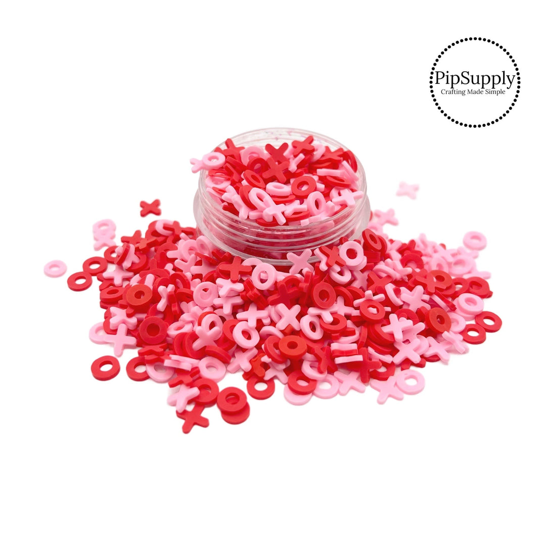This pink and red clay slices mix is versatile for many craft projects. This Valentine's Day mix has XOXO. You can use it to add sparkle and decoration to resin projects, filling for shaker bows, slime making, party decor, scrapbooking, card making and nail art.

 One bag is 1 OZ 
* Bags are resealable 