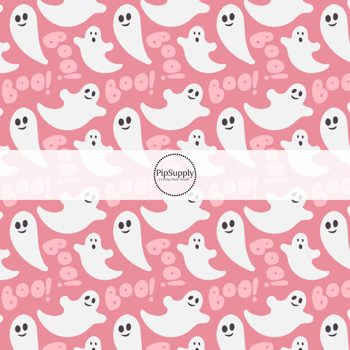 Bubblegum pink fabric by the yard with white ghosts and the phrase "Boo!"