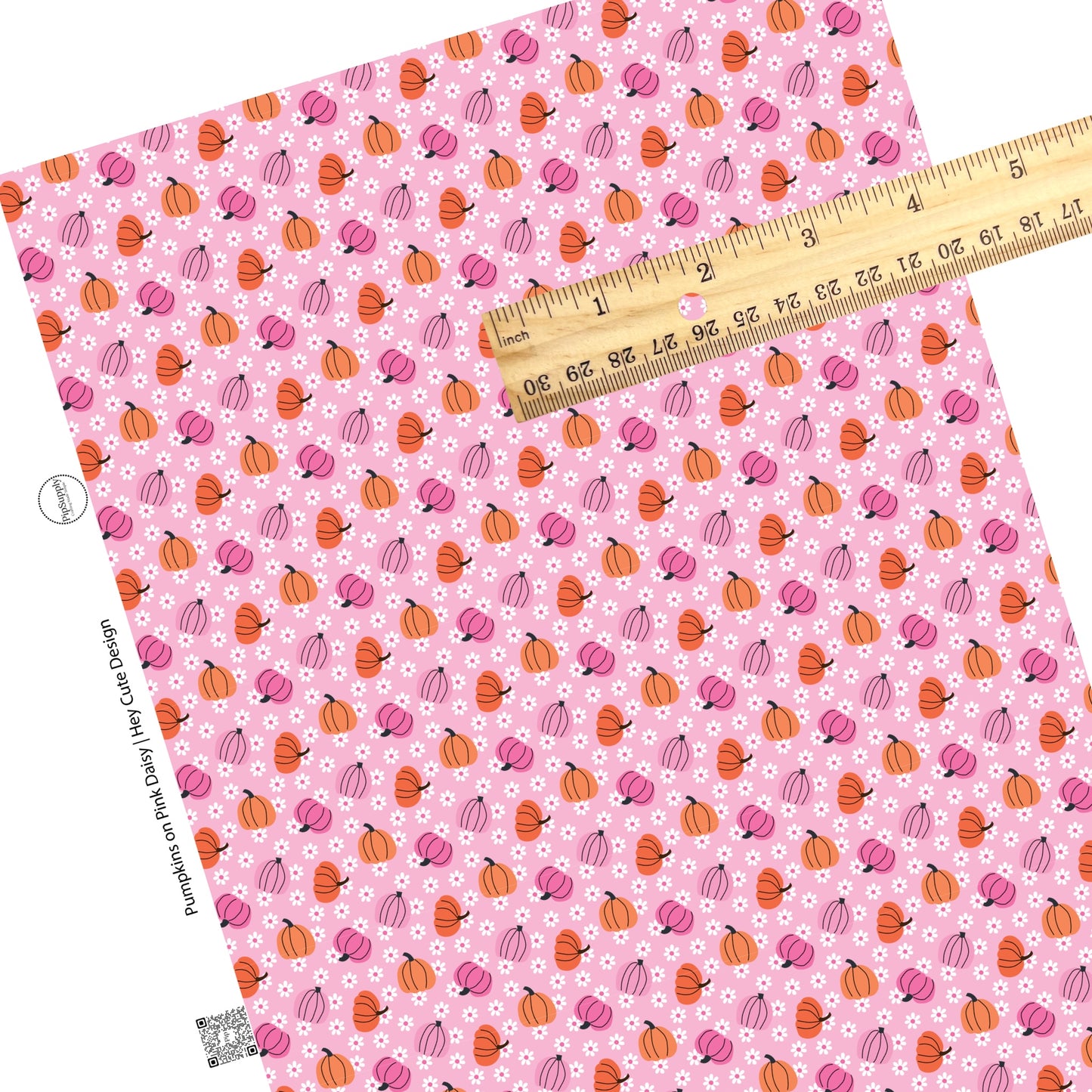 These Halloween themed pink faux leather sheets contain the following design elements: orange and pink pumpkins surrounded by tiny white daisies on pink. Our CPSIA compliant faux leather sheets or rolls can be used for all types of crafting projects.