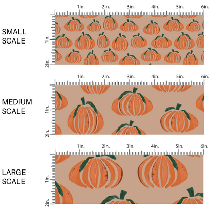 Orange pumpkins on taupe colored fabric by the yard scaled image guide.