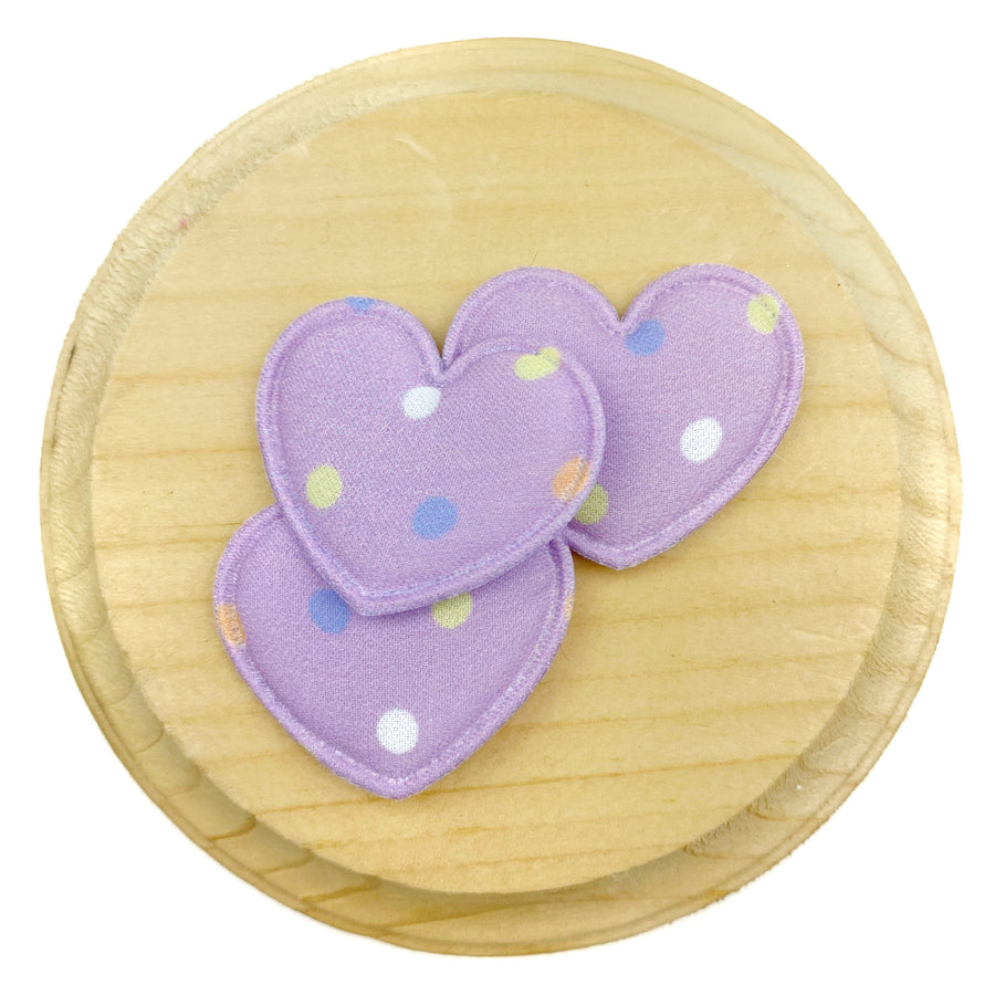 Lavender heart-shaped appliqués featuring scattered pastel polka dots in white, blue, yellow, and peach, finished with a coordinating satin-stitched embroidered border for a soft, cheerful, and whimsical look.
Heart Appliques
Sets of 3
Approx 35 mm x 25 mm