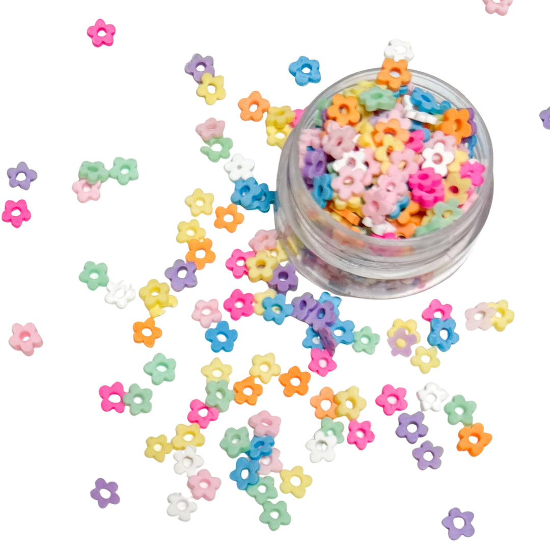 These flower slices are versatile for many festive craft projects. These clays are shaped as rainbow flower designed clay slices. You can use it to add sparkle and decoration to resin projects, filling for shaker bows, slime making, party decor, scrapbooking, card making and nail art.
One bag is 1 oz
Bags are resealable for repetitive use