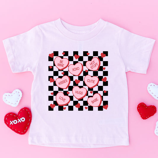 Red and Pink Conversation Hearts Candies on a Black Checkered Background Iron On Heat Transfer