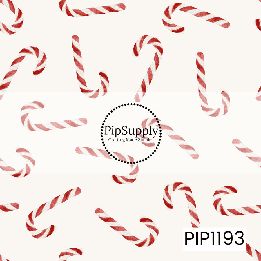 A simple watercolor Christmas pattern featuring classic red and white striped candy canes scattered in different directions across a soft cream background. The hand-painted texture gives the design a sweet, vintage-inspired holiday feel.
