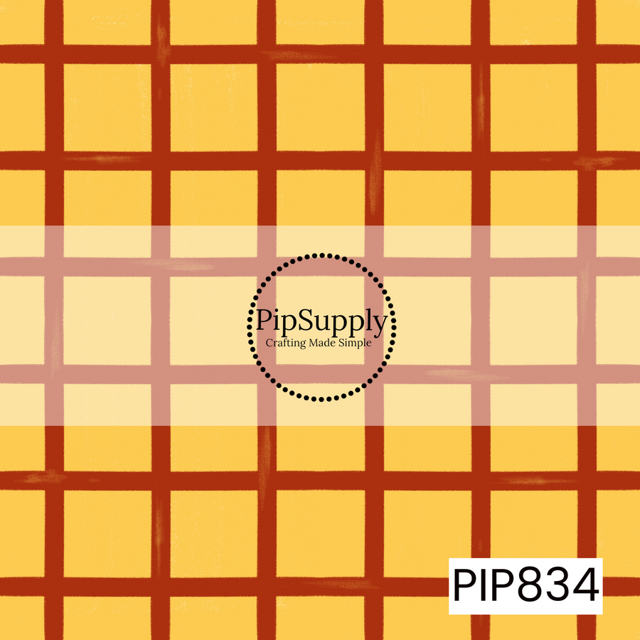 Warm golden-yellow background featuring a hand-painted plaid pattern created with textured rust-red brushstroke lines. The grid forms large squares with an organic, slightly imperfect look that adds a handcrafted feel. The rich yellow and red color palette creates a cozy western-inspired design with a playful, vintage charm.
