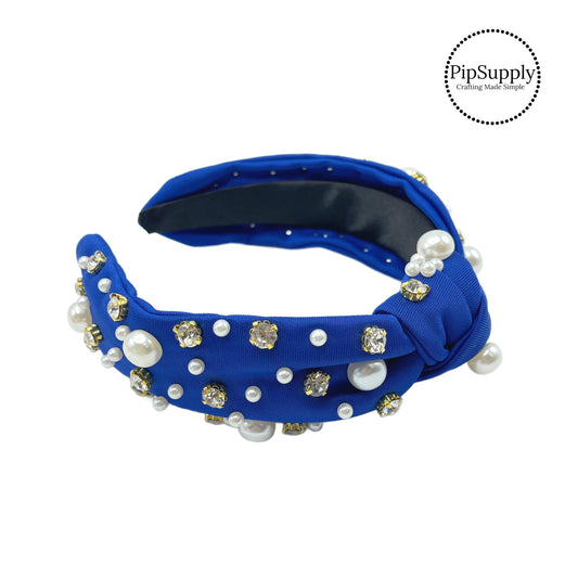 These embellished headbands with pearls and rhinestones are a stylish hair accessory having the look of a knotted headwrap and the on and off ease of a headband. Made with thick high quality fabric these headbands are a perfect simple and fashionable answer to keeping your hair back!