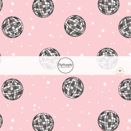 Light Pink Fabric by the yard with silver and black disco balls.