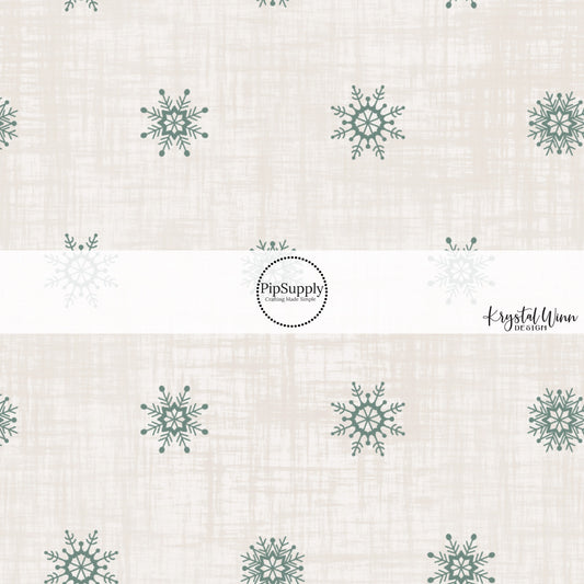 These holiday pattern themed fabric by the yard features Christmas green snowflakes on cream. This fun Christmas fabric can be used for all your sewing and crafting needs!