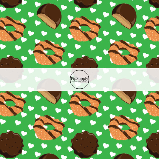 Classic Scout Cookies and White Hearts on Green Fabric by the Yard.