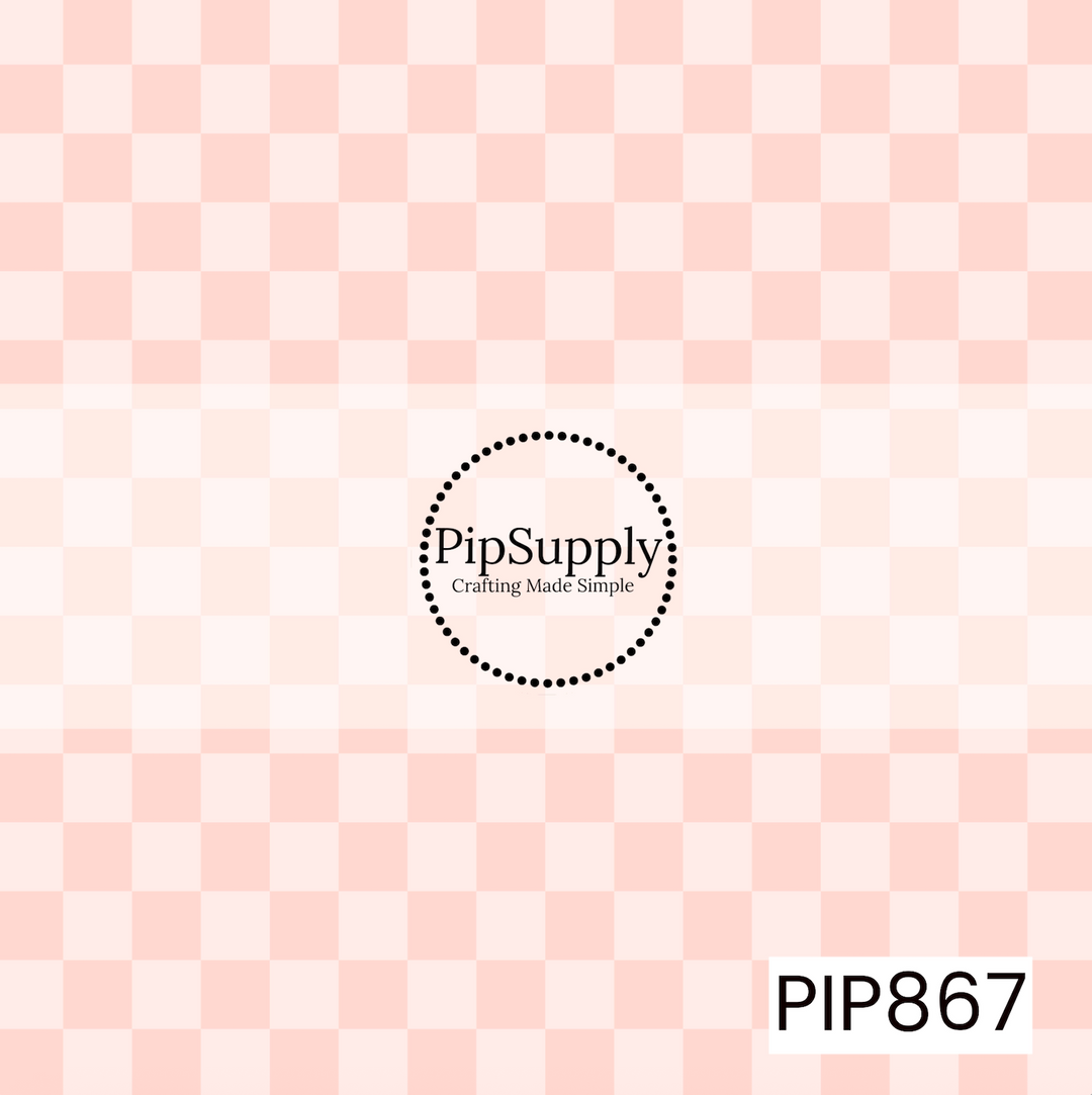 A soft checkerboard pattern featuring alternating squares in blush pink and pale pink. 