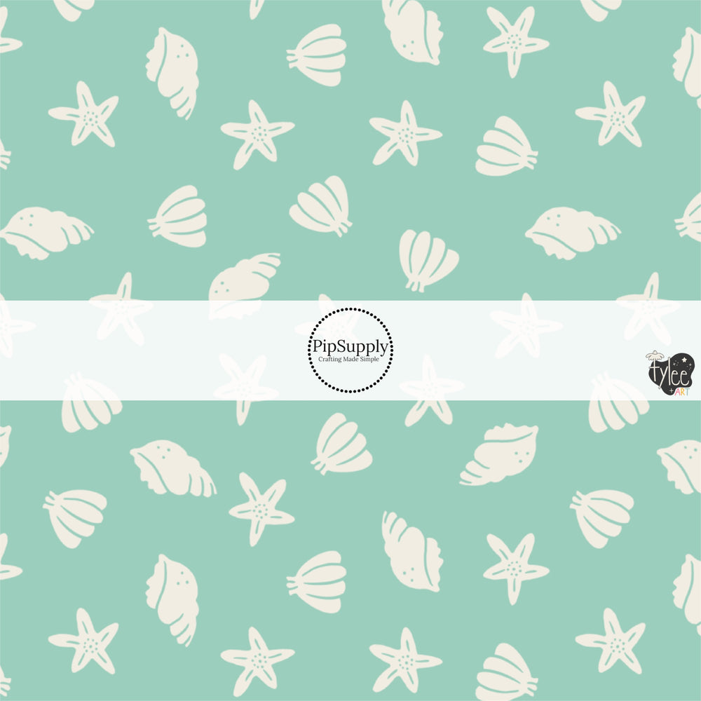 These beach themed no sew bow strips can be easily tied and attached to a clip for a finished hair bow. These patterned bow strips are great for personal use or to sell. These bow strips feature seashells on light green.