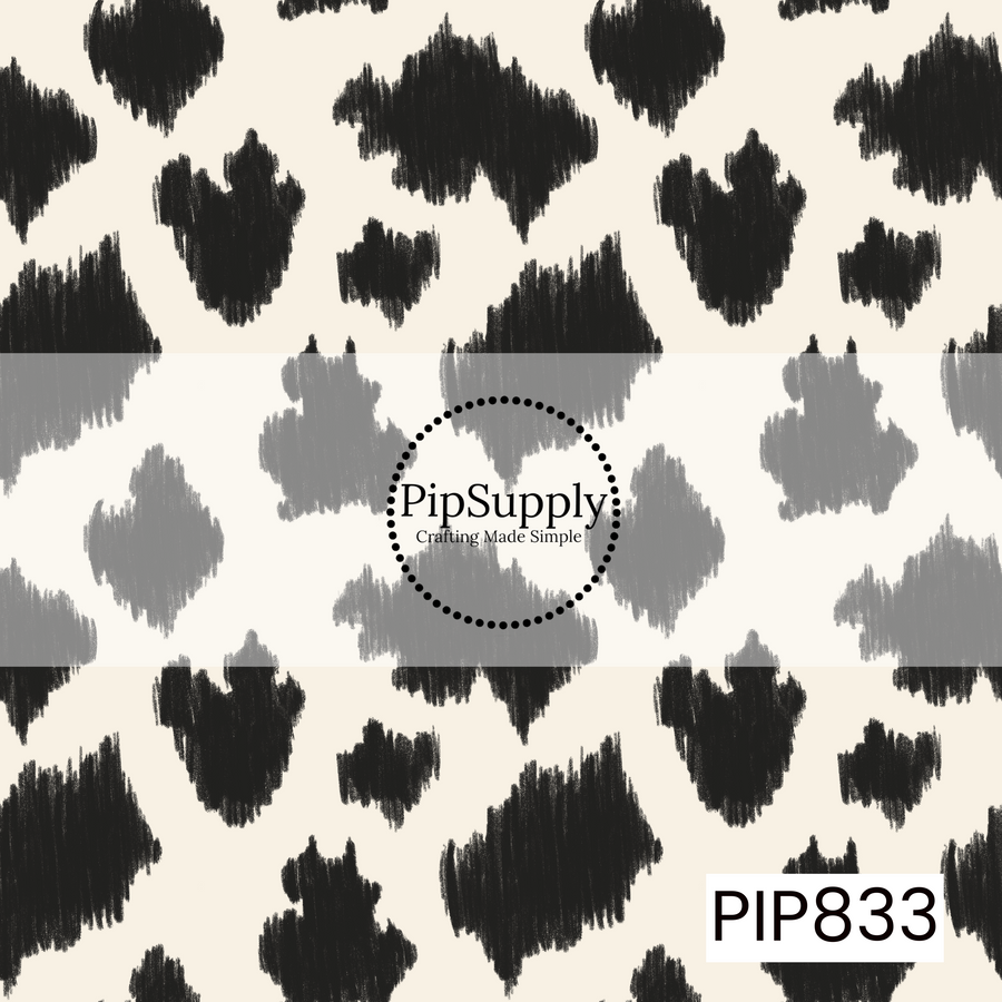 Cream background featuring a repeating pattern of hand-drawn black cow-print spots with a textured, sketch-like appearance. The irregular organic shapes create a playful western-inspired look, while the simple black-and-cream color palette gives the design a bold, modern, and trendy aesthetic.
