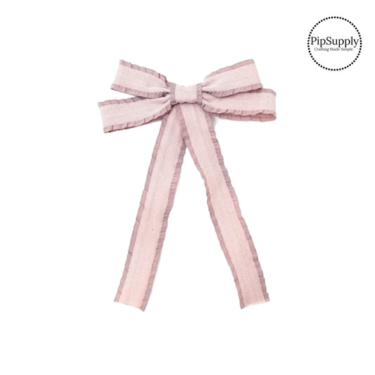 Theses shimmer woven ruffled long tail hair bows are ready to package and resell to your customers no sewing or measuring necessary! These come pre-tied with an attached alligator clip. The delicate bow is perfect for all hair styles for kids and adults.