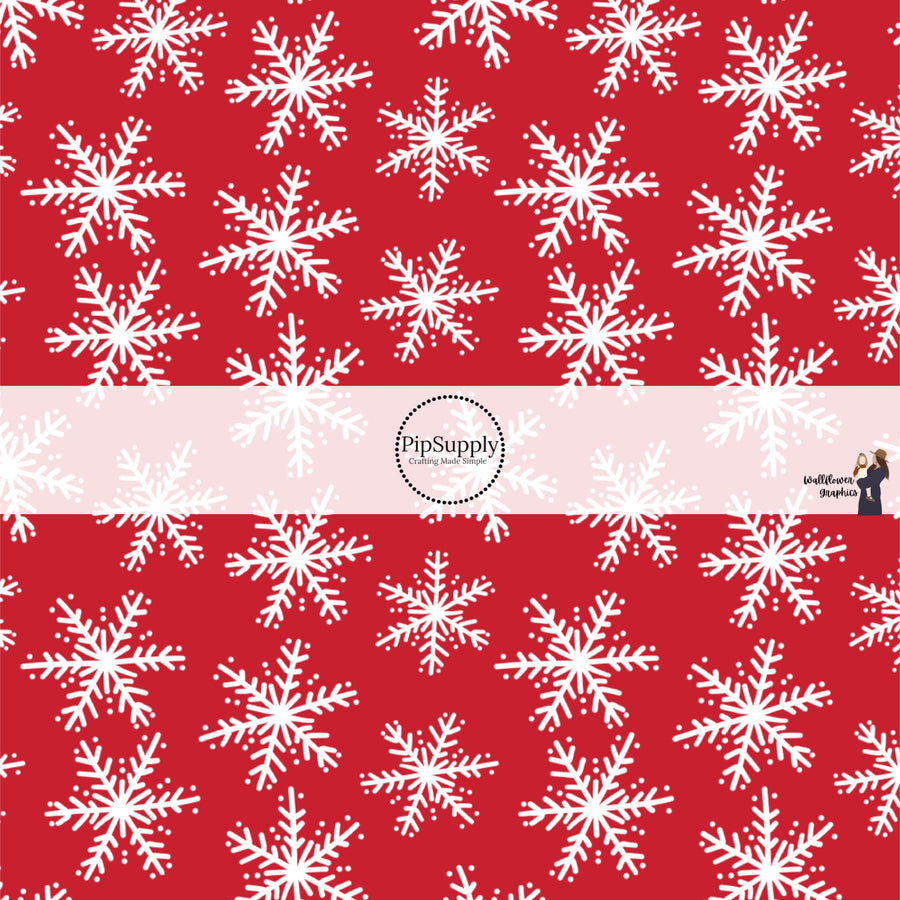 Red Christmas fabric by the yard with white snowflakes.