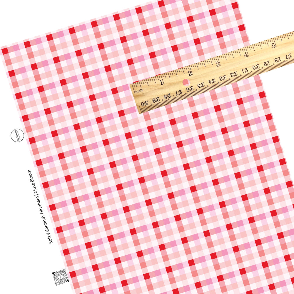 These Valentine's pattern themed faux leather sheets contain the following design elements: red, hot pink, peach, light pink, and white gingham. Our CPSIA compliant faux leather sheets or rolls can be used for all types of crafting projects.