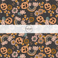Rainbows, Jack-O-Lanterns, candies, and florals on black fabric by the yard.