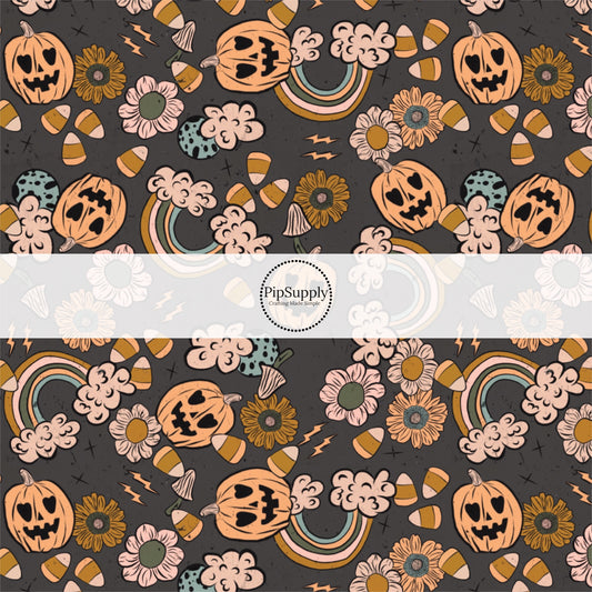 Rainbows, Jack-O-Lanterns, candies, and florals on black fabric by the yard.