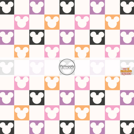 Pink, black, and orange mouse head silhouette white checkered print fabric by the yard.