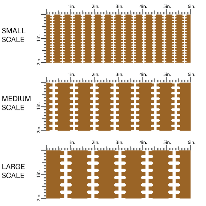 Brown fabric by the yard scaled image guide with white football stitching.