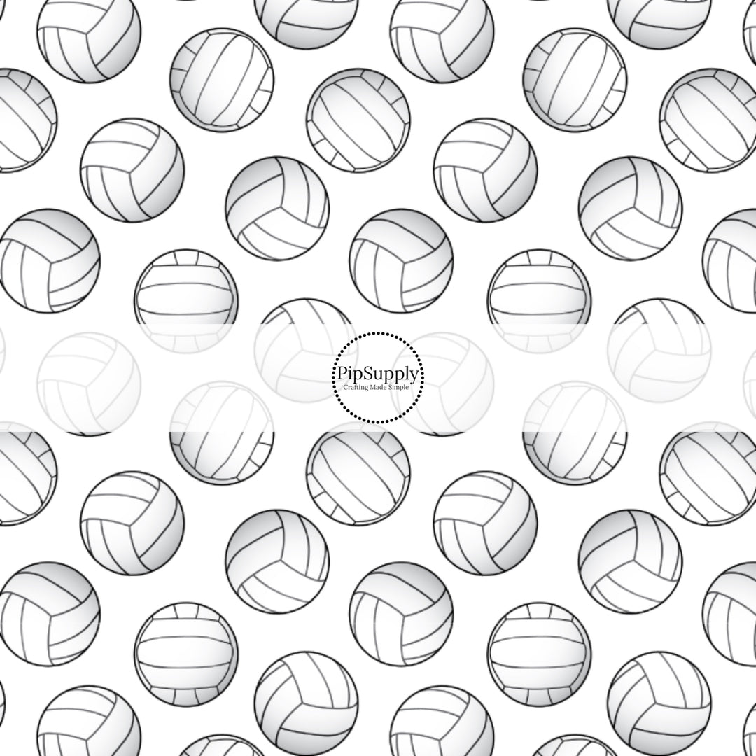 White and black volleyballs on white fabric by the yard.