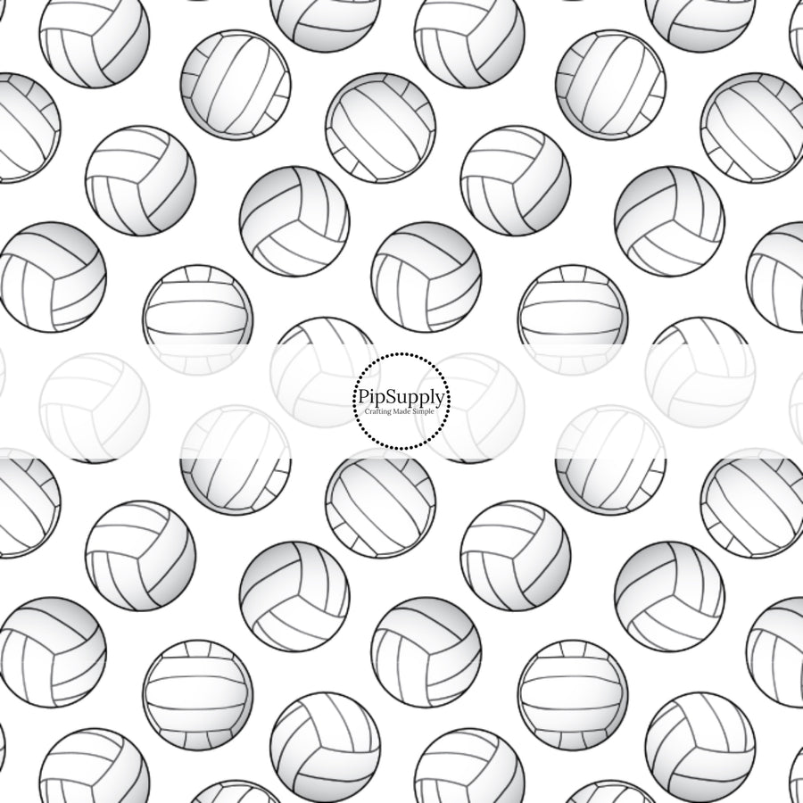 White and black volleyballs on white fabric by the yard.