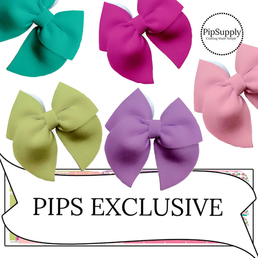 bright purples pinks and greens on solid neoprene diy hair bows