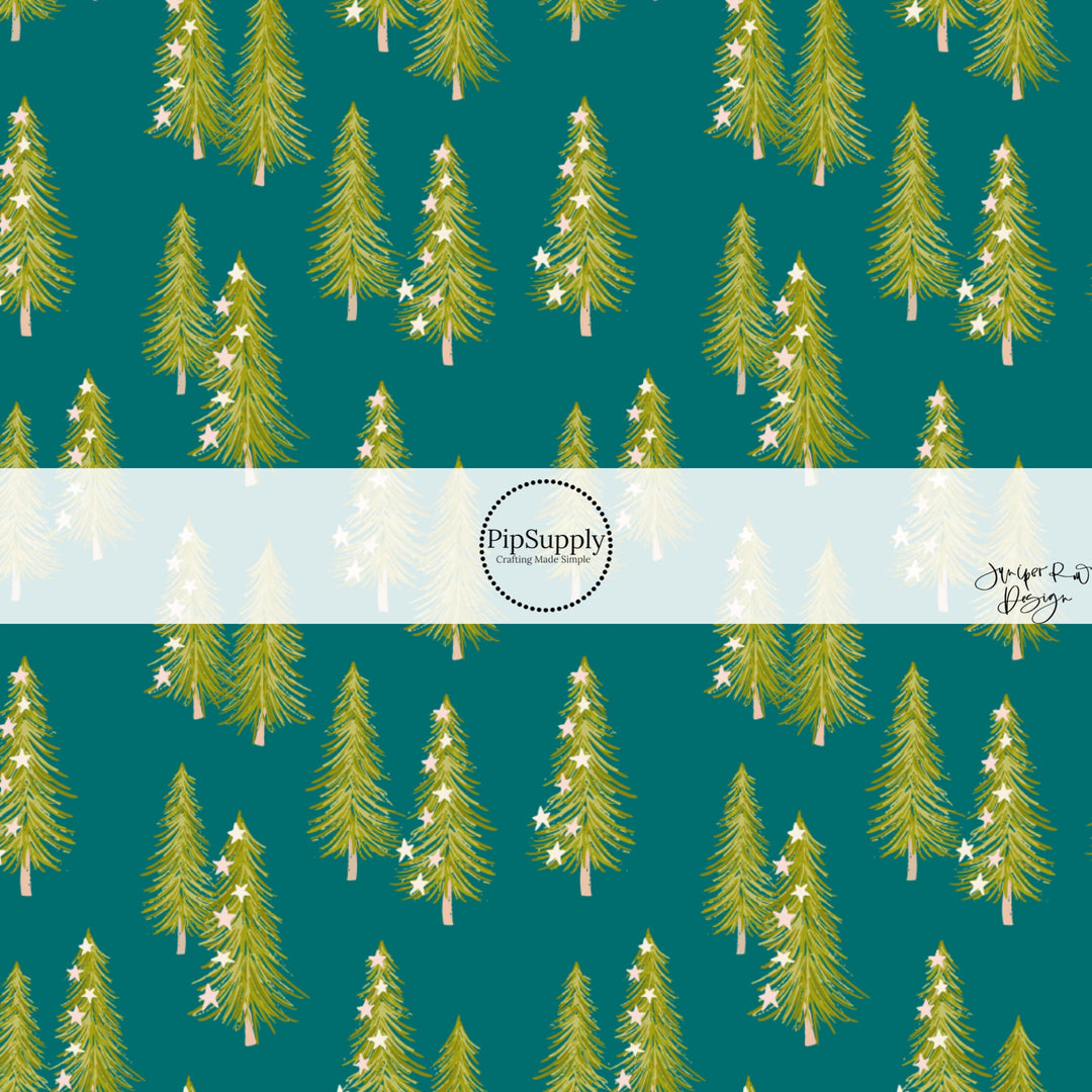 These holiday pattern themed fabric by the yard features tiny stars on Christmas trees on teal. This fun Christmas fabric can be used for all your sewing and crafting needs!