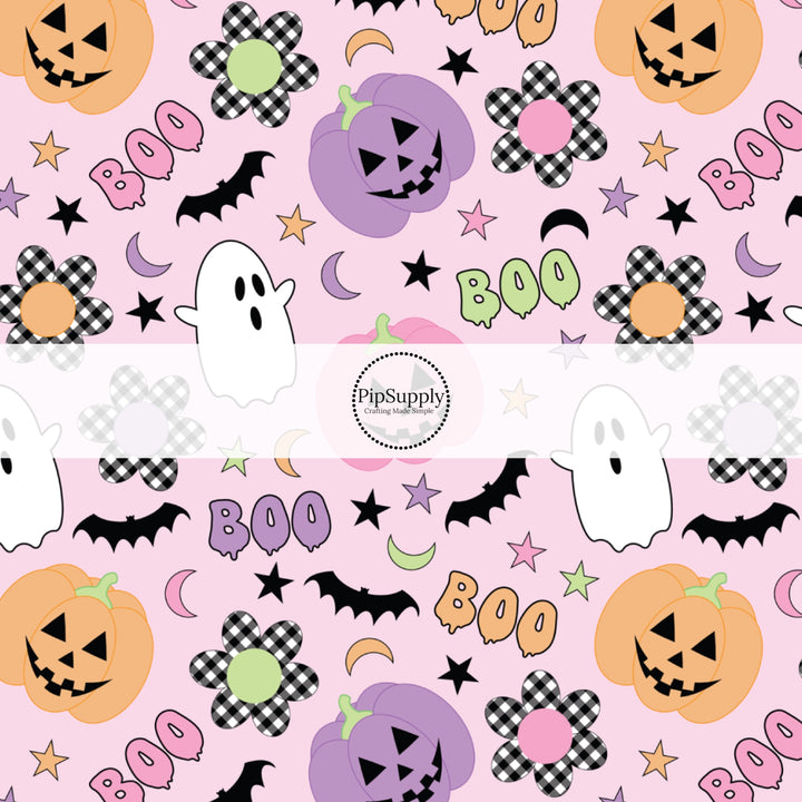 These Halloween themed pattern fabric by the yard features the following design elements: ghost, smiley pumpkins, flowers, and bats on light pink. This fun spooky themed fabric can be used for all your sewing and crafting needs!