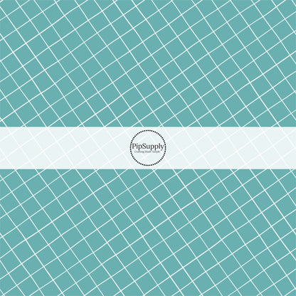 Teal fabric by the yard with white grid lines.