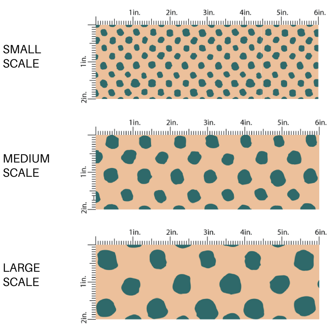 Teal blue speckled dots on cream fabric by the yard scaled image guide.