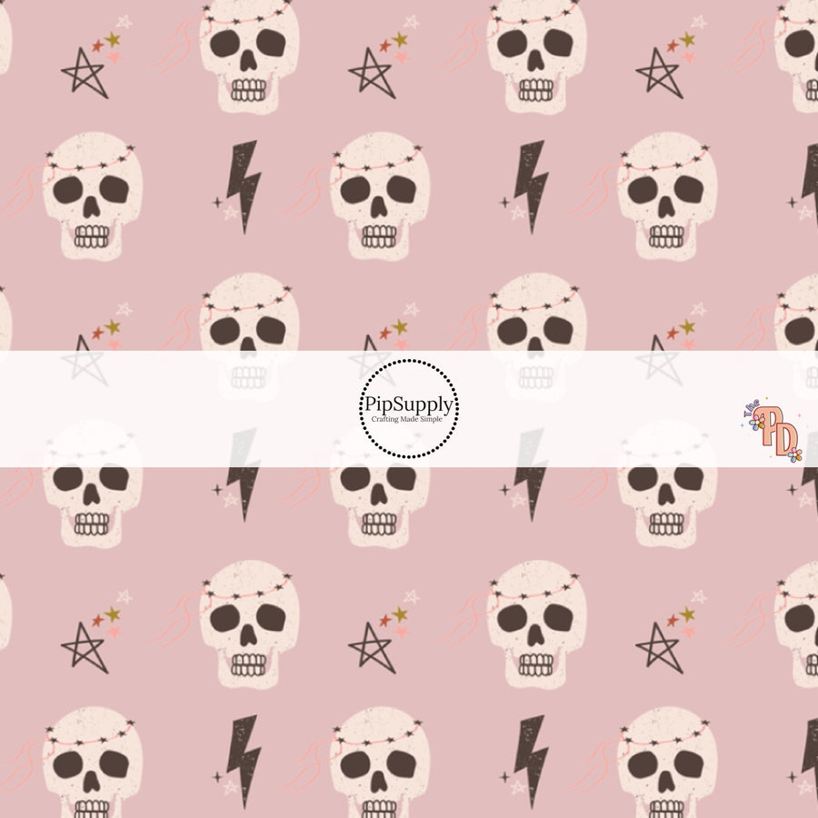 Light purple fabric by the yard with skulls, lightning bolts, and stars.