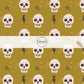 Skeletons and Stars on yellow-green fabric by the yard.