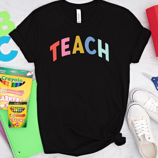 Multi-colored "Teach" back to school themed iron on heat transfer.