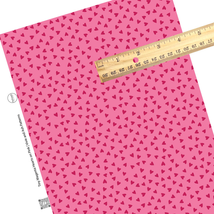 These Valentine's pattern themed faux leather sheets contain the following design elements: tiny magenta hearts on pink. Our CPSIA compliant faux leather sheets or rolls can be used for all types of crafting projects.