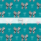 Cow Print and Blue Coquette Bows on Turquoise Fabric by the Yard.