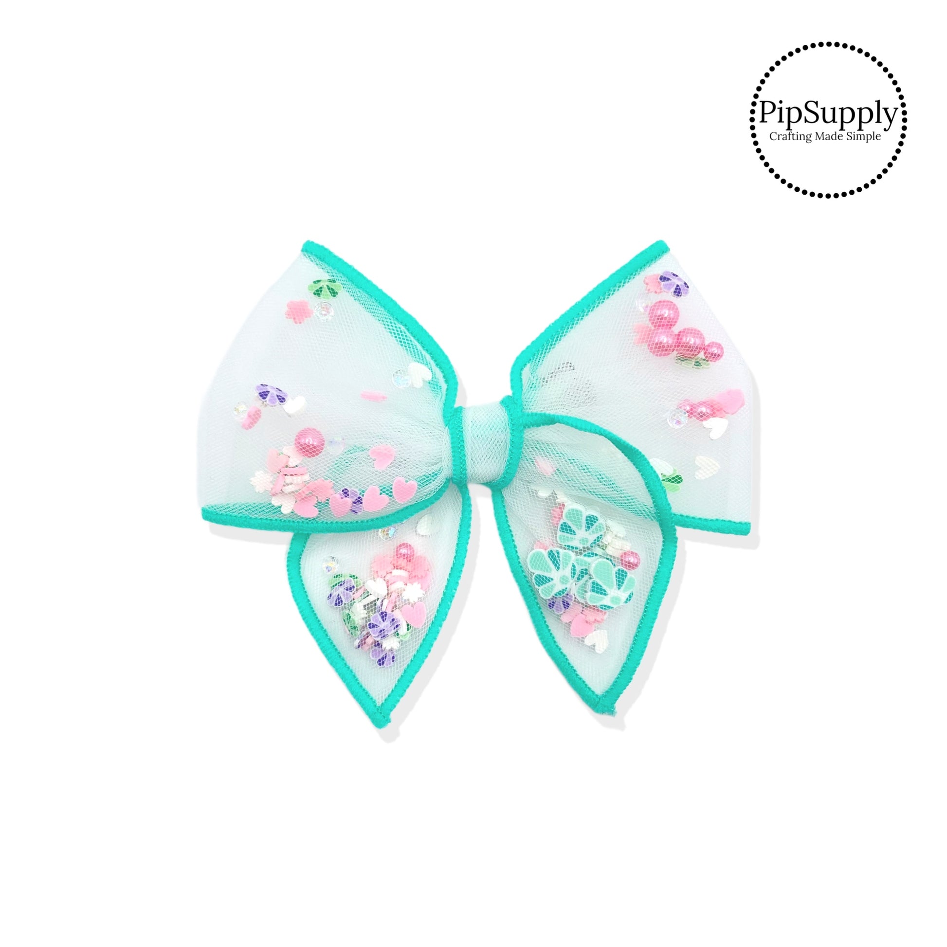 These teal stitched white tulle pre-cut shaker tied bows are ready to package and resell to your customers no sewing or measuring necessary! These hair bows come with a silver alligator clip already attached and come filled with shells, pearls, and sprinkles.