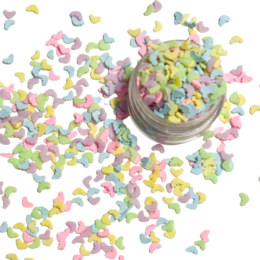 This bats clay slices is versatile for many craft projects. This Halloween has pastel purple, pink, yellow, green, and blue bats. You can use it to add sparkle and decoration to resin projects, filling for shaker bows, slime making, party decor, scrapbooking, card making and nail art.