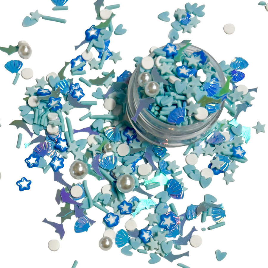 These ocean blue clay slices are versatile for many craft projects. This loose clay has dolphin and seashell sequins, heart, stars, and dots clay slices and pearls. You can use it to add sparkle and decoration to resin projects, filling for shaker bows, slime making, party decor, scrapbooking, card making and nail art.