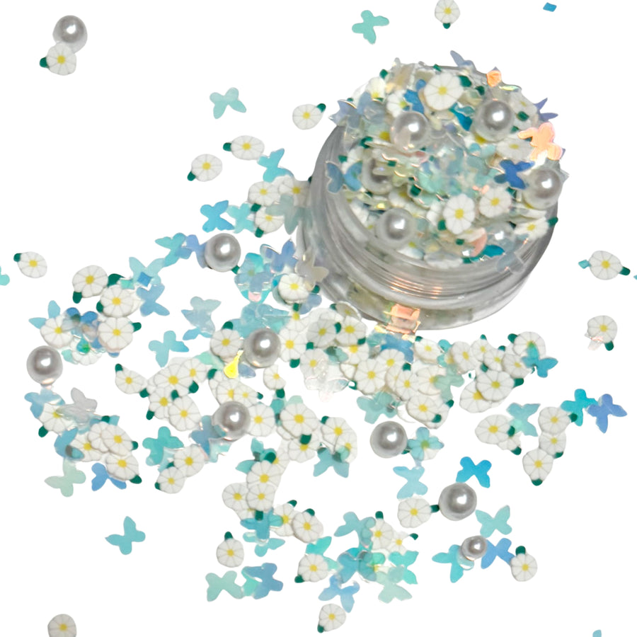 These Butterfly Garden Clay slices are versatile for many festive craft projects. These clays are shaped as butterfly, floral &amp; pearl designed clay slices. You can use it to add sparkle and decoration to resin projects, filling for shaker bows, slime making, party decor, scrapbooking, card making and nail art.