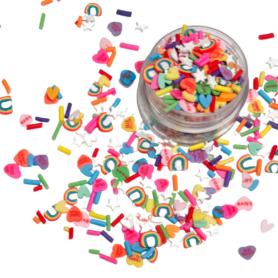 These I love Rainbows Clay slices are versatile for many festive craft projects. These clays are shaped as rainbow, sprinkles, &amp; hearts designed clay slices. You can use it to add sparkle and decoration to resin projects, filling for shaker bows, slime making, party decor, scrapbooking, card making and nail art.