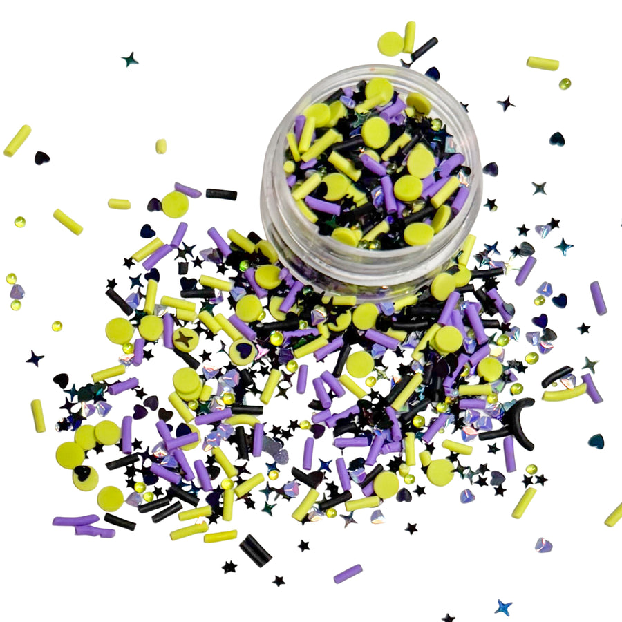 This villain inspired clay slice mix is versatile for many craft projects. This green and purple mix has sprinkles, dots, hearts, and diamonds. You can use it to add sparkle and decoration to resin projects, filling for shaker bows, slime making, party decor, scrapbooking, card making and nail art.