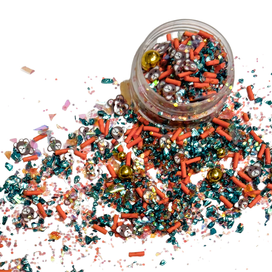 This princess inspired clay slice mix is versatile for many craft projects. This sprinkle mix has brown bear, blue confetti, gold pearls, and orange sprinkles. You can use it to add sparkle and decoration to resin projects, filling for shaker bows, slime making, party decor, scrapbooking, card making and nail art.