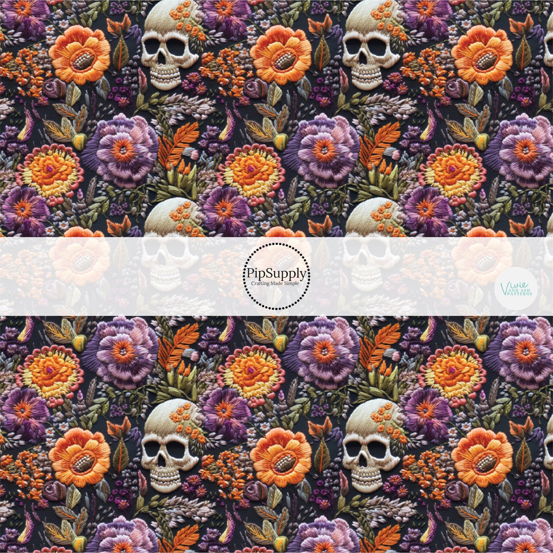 Black fabric by the yard with skulls and yellow and purple embroidered florals.