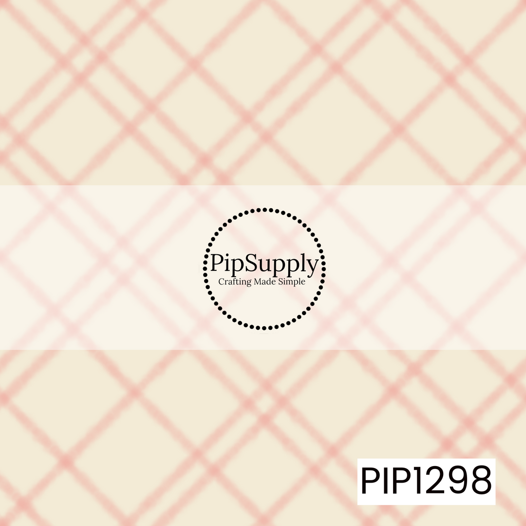 A soft watercolor plaid featuring blush pink crisscrossing lines over a warm cream background. The slightly blurred, hand-painted lines give the classic plaid a sweet, whimsical feel.

