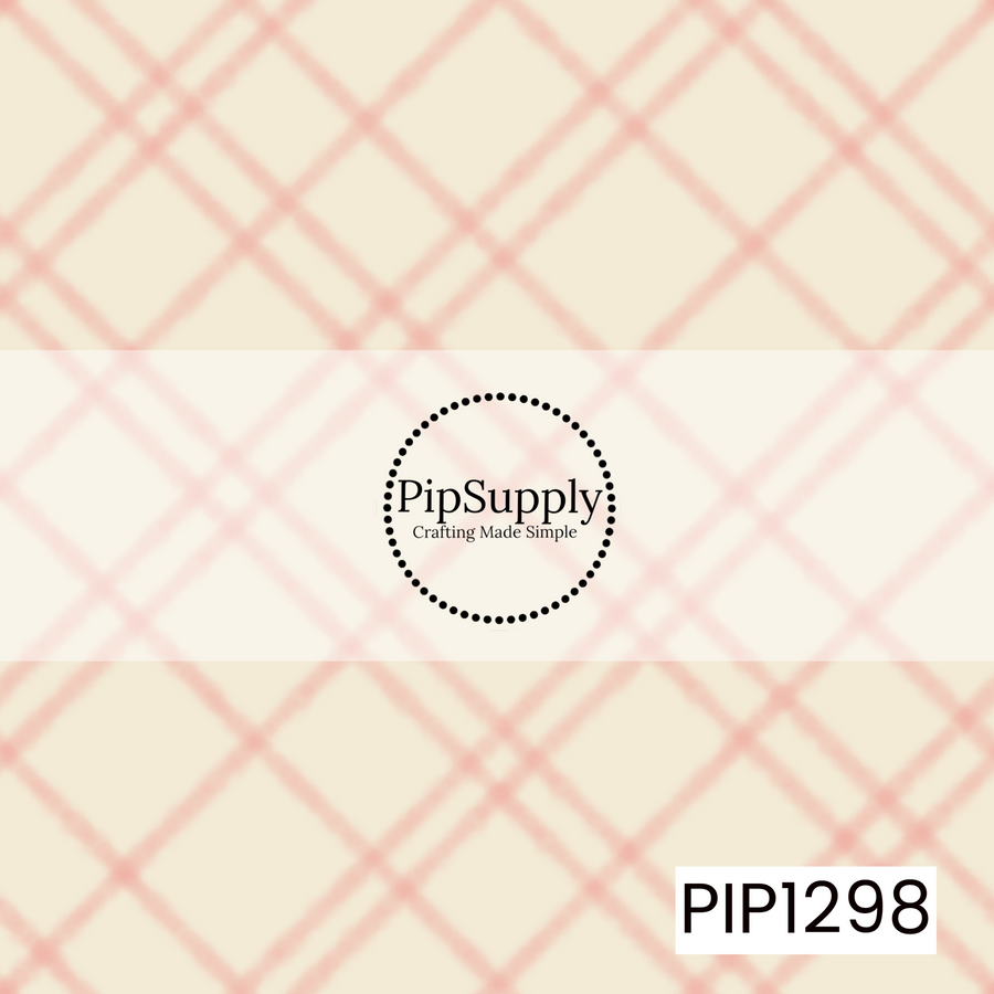 A soft watercolor plaid featuring blush pink crisscrossing lines over a warm cream background. The slightly blurred, hand-painted lines give the classic plaid a sweet, whimsical feel.
