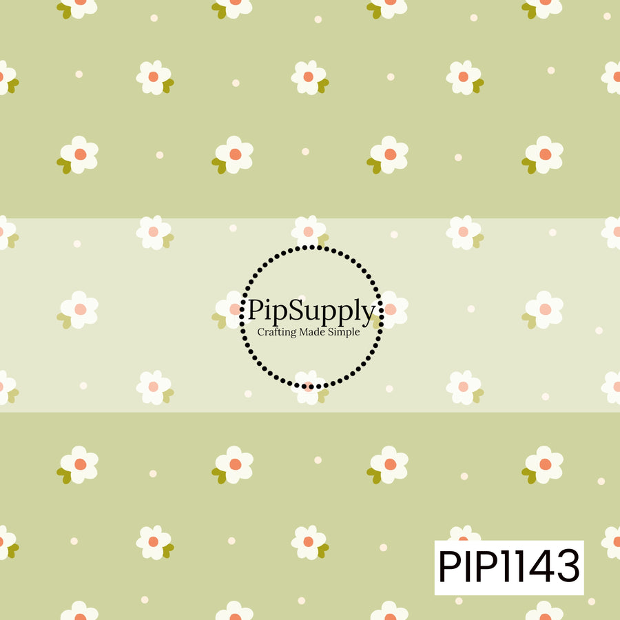 A cheerful floral toss featuring petite white blossoms with coral centers, olive-green leaves, and tiny cream dots scattered across a soft sage-green background.
