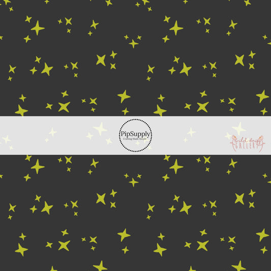 Lime green stars on charcoal fabric by the yard.